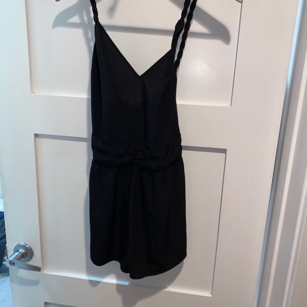 Black romper planet blue